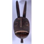 A WEST AFRICAN GIPHOGO TYPE WOODEN MASK, formed as a stylised rabbit. 58 cm long.