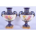 Royal Worcester pair of vases with face mask handles shape 1572 painted with flowers between a blue
