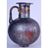 A RARE ROMAN LUSTRE GLASS JUG, formed with a bulbous body. 19.5 cm high.