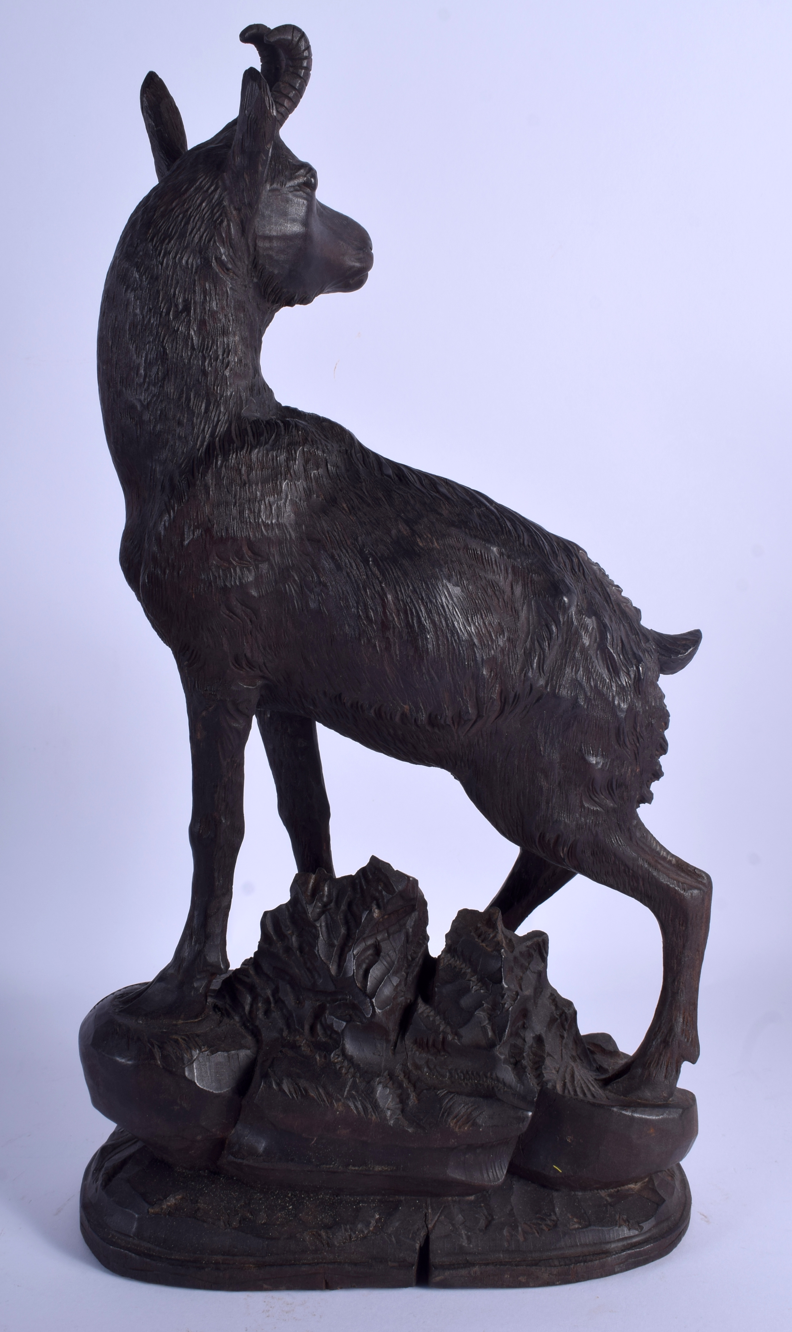 A LARGE ANTIQUE BAVARIAN BLACK FOREST STANDING STAG IBEX modelled upon a naturalistic base. 44 cm x - Image 2 of 3