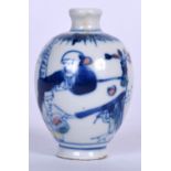 A CHINESE BLUE AND WHITE PORCELAIN SNUFF BOTTLE, decorated with figures in a landscape. 6.5 cm high