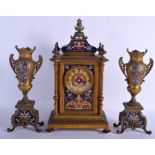 A 19TH CENTURY FRENCH BRONZE AND CHAMPLEVÉ ENAMEL CLOCK GARNITURE decorated with foliage. Mantel 39