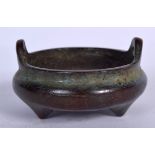 A CHINESE BRONZE CENSER, formed with twin handles, signed. 5.5 cm wide.
