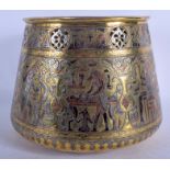 A 19TH CENTURY MIDDLE EASTERN SILVER INLAID CAIRO WARE JARDINIERE decorated with Egyptian figures.