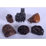 A 19TH CENTURY JAPANESE MEIJI PERIOD CARVED BOXWOOD NETSUKE together with six other netsukes. (7)