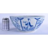 A LARGE 19TH CENTURY CHINESE BLUE AND WHITE PORCELAIN BOWL Qing, painted with figures within landsc