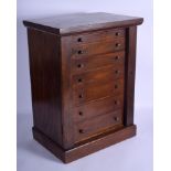 A GOOD VICTORIAN CASED SPECIMEN WELLINGTON CHEST. 50 cm x 35 cm.