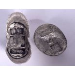 TWO CHINESE WHITE METAL INGOTS. Largest 8 cm wide. (2)