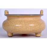 A CHINESE GE TYPE POTTERY CENSER, formed with squat feet and high loop handles. 19 cm wide.