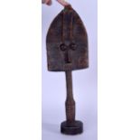 A MAHONGWE TRIBE BAKOTA RELIQUARY GUARDIAN FIGURE, formed with bulging eyes and copper bound body.