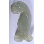 AN EARLY 20TH CENTURY CHINESE MUGHAL STYLE JADE DAGGER HANDLE. 13 cm x 5 cm.