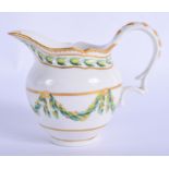 18th c Bristol milk jug painted with two tone green swags and husks X1 mark in blue. 12 cm wide.