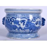 A CHINESE BLUE AND WHITE PORCELAIN CENSER, twin handled and decorated with mythical beasts. 15 cm w