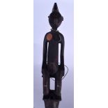 AN AFRICAN CARVED WOODEN STAFF, formed with figural terminal. 122 cm long.
