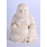 AN EARLY 20TH CENTURY CHINESE CARVED IVORY BUDDHA Late Qing. 6.5 cm x 4.5 cm.