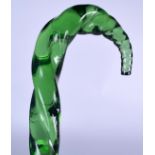 A VINTAGE GREEN GLASS WALKING STICK, formed with ribbed body. 111 cm long.