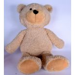 A HUGE STEIFF TEDDY BEAR, bearing button and label to ear. 80 cm long.