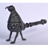 AN ISLAMIC BRONZE INCENSE BURNER, in the form of a bird. 24 cm x 34 cm.