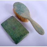 AN ART DECO SILVER OVERLAID SHAGREEN CIGARETTE CASE together with a similar brush. 23 cm & 15 cm lo