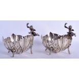 A PAIR OF 19TH CENTURY CONTINENTAL SILVER BON BON DISHES modelled with cherubs. 23 oz. 18 cm x 14 c