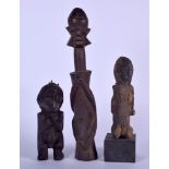 THREE AFRICAN CARVED WOODEN FIGURES, varying form. Largest 40 cm. (3)