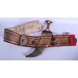 A LARGE ANTIQUE YEMENI OMANI RHINOCEROS HORN HANDLED JAMBIYA DAGGER inset with gold coinage. 35 cm