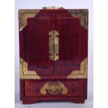 A CHINESE LACQUERED TABLE CABINET, formed with brass fittings. 21.5 cm x 15.5 cm.