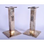 A PAIR OF 1940S HAMMERED SILVER CANDLESTICKS. 33.8 oz overall. 20 cm high.