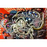 A LARGE QUANTITY OF COSTUME JEWELLERY, varying form and style. (qty)