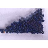 A QUANTITY OF LAPIS LAZULI BEADS, of tiny proportions (qty)