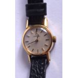 A SMALL 1980S LADIES GOLD PLATED OMEGA WRISTWATCH. 1.25 cm wide.