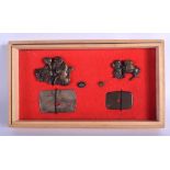 A BOXED SET OF 19TH CENTURY JAPANESE MEIJI PERIOD BRONZE SWORD FITTINGS in various forms and sizes.