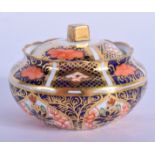 Royal Crown Derby miniature circular box and cover painted with pattern 1128 date code for 1920. 6c