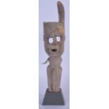 AN IVORY COAST JIMINI CARVED WOODEN SCULPTURE, formed with an open mouth and curving horns. 40 cm h