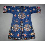 A 1920S CHINESE MIDNIGHT BLUE SUMMER ROBE Late Qing/Republic, decorated with figures and foliage. 1