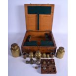 A LOVELY CASED SET OF ANTIQUE SCOTTISH COUNCIL WEIGHTS in various forms and sizes. (qty)