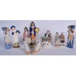 THREE 19TH CENTURY STAFFORDSHIRE POTTERY FIGURINES, together with other porcelain figures. (qty)