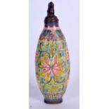 A CHINESE ENAMEL SNUFF BOTTLE BEARING KANGXI MARKS, decorated with foliage. 10.75 cm high.