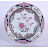 AN 18TH CENTURY CHINESE FAMILLE ROSE PORCELAIN DISH, decorated with foliage. 23 cm wide.