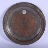 A 17TH CENTURY SAFAVID TINNED COPPER PLATE Persia, decorated with fish. 18 cm wide.