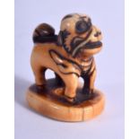 AN 18TH CENTURY JAPANESE EDO PERIOD CARVED IVORY SEAL modelled as a Buddhistic lion. 3 cm x 2.5 cm.