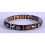 A CHINESE TIBETAN AGATE ZHU BANGLE 20th Century. 7.5 cm wide.