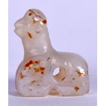 AN EGYPTIAN CARVED AGATE PENDANT, in the form of a bird. 2 cm high.