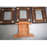 THREE MUGHAL / PERSIAN FRAMES, varying style and decoration, together with a sliding frame. Set 46