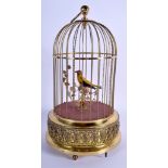 A VINTAGE 1950S GERMAN BRASS SINGING BIRD CAGE. 30 cm high.