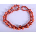 AN ANTIQUE CORAL NECKLACE. 47 cm long.