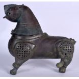AN ISLAMIC BRONZE INCENSE BURNER, in the form of a standing mythical beast. 26 cm x 27 cm.