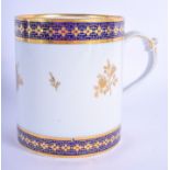 19th c. Barr Worcester fine mug with a distinctive handle painted in under glaze blue and gilded wi