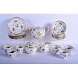 AN ANTIQUE MEISSEN PORCELAIN TEASET painted with flowers and gilt motifs. Largest 22 cm wide (qty)