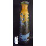 A VERY LARGE CONTINENTAL ART CAMEO GLASS VASE decorated with lily pads and insects. 63 cm high.